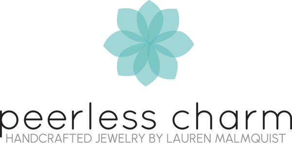 Peerless Charm logo